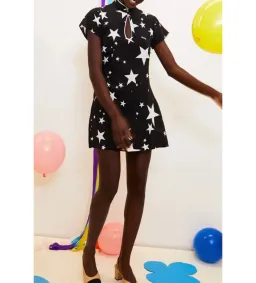 Rixo Lolita Star Mini Dress in Black Print Size UK 10 for rent on The Volte - image 1