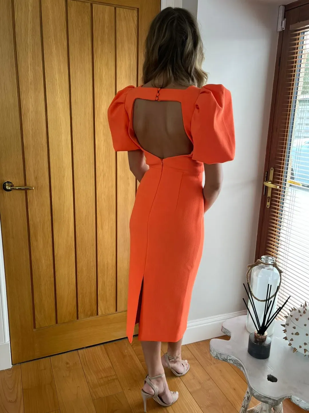 Rebecca Vallance Orange Backless Midi Dress UK Size 8 for rent on The Volte - main image